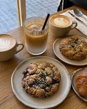 AI render: Bruto cookies on a café table with lattes