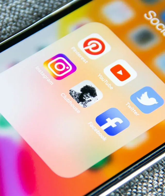 Instagram, YouTube and Facebook apps on a phone screen